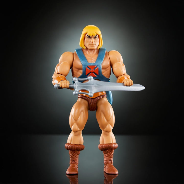 Jucărie Masters of the Universe Origins, He-Man figurină de acțiune din colecția de desene animate, la scară reală, aprox. 14 cm înălțime, erou cu armură, 2 săbii și mini benzi desenate, HYD17 Action figures Naty Shop